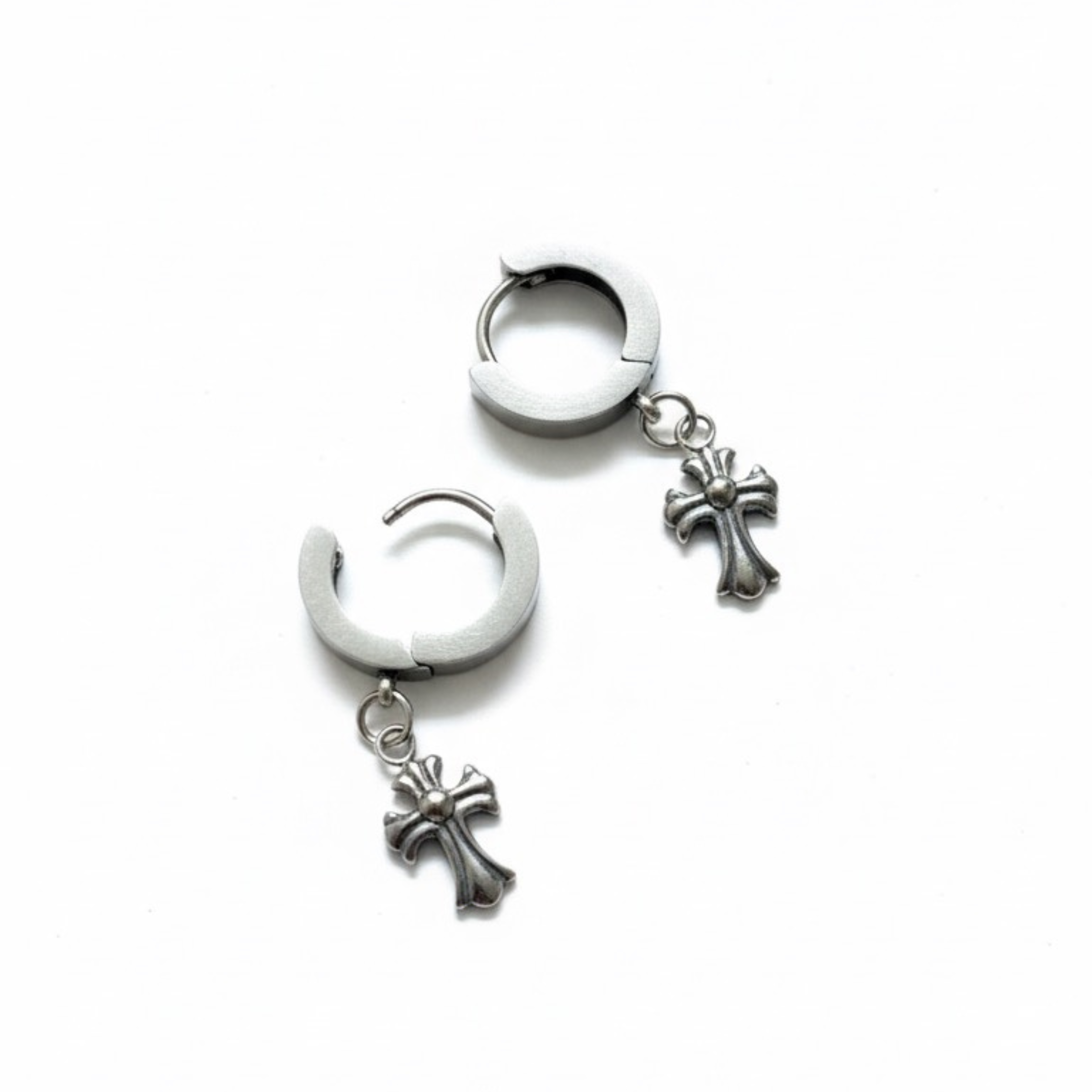 The Creed Silver Cross Huggie Earrings